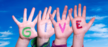 Children raising their hands to spell "GIVE," representing charitable giving and nonprofit support with guidance from WCS CPA a CPA firm in Baltimore.